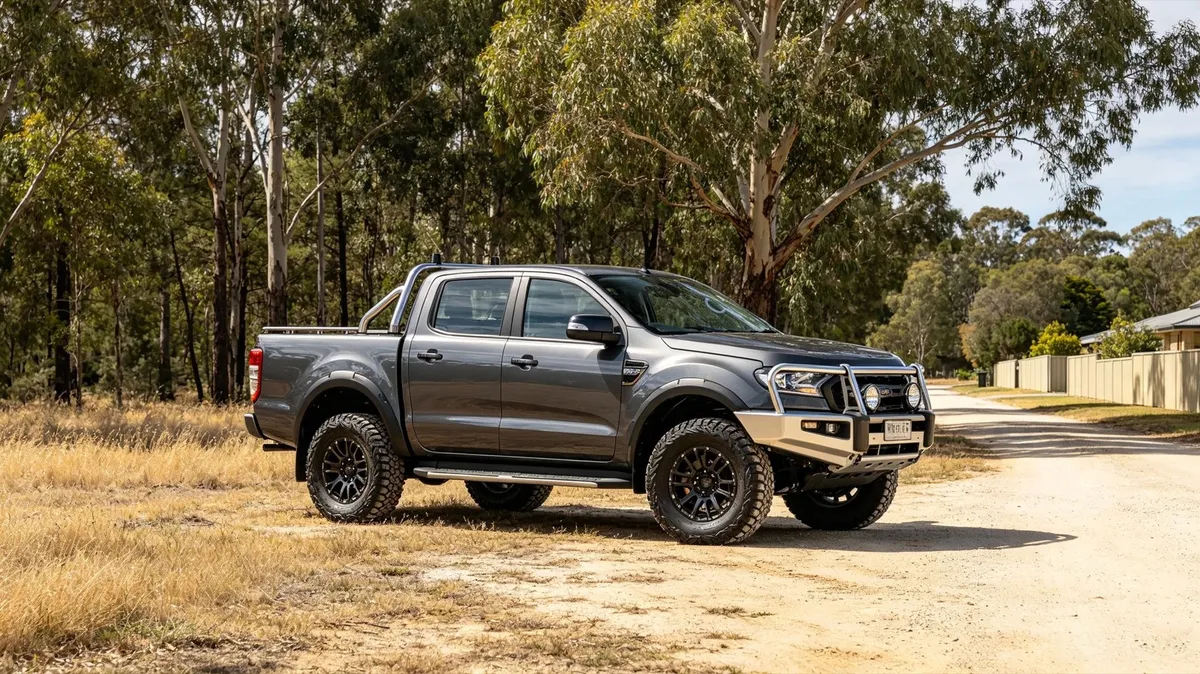 A rugged dual-cab ute parked in an Australian setting